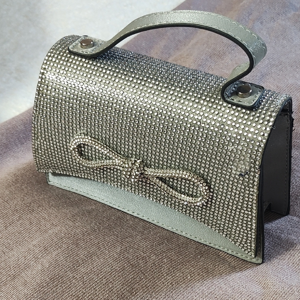 Aldo Silver Clutch with Bow Detail